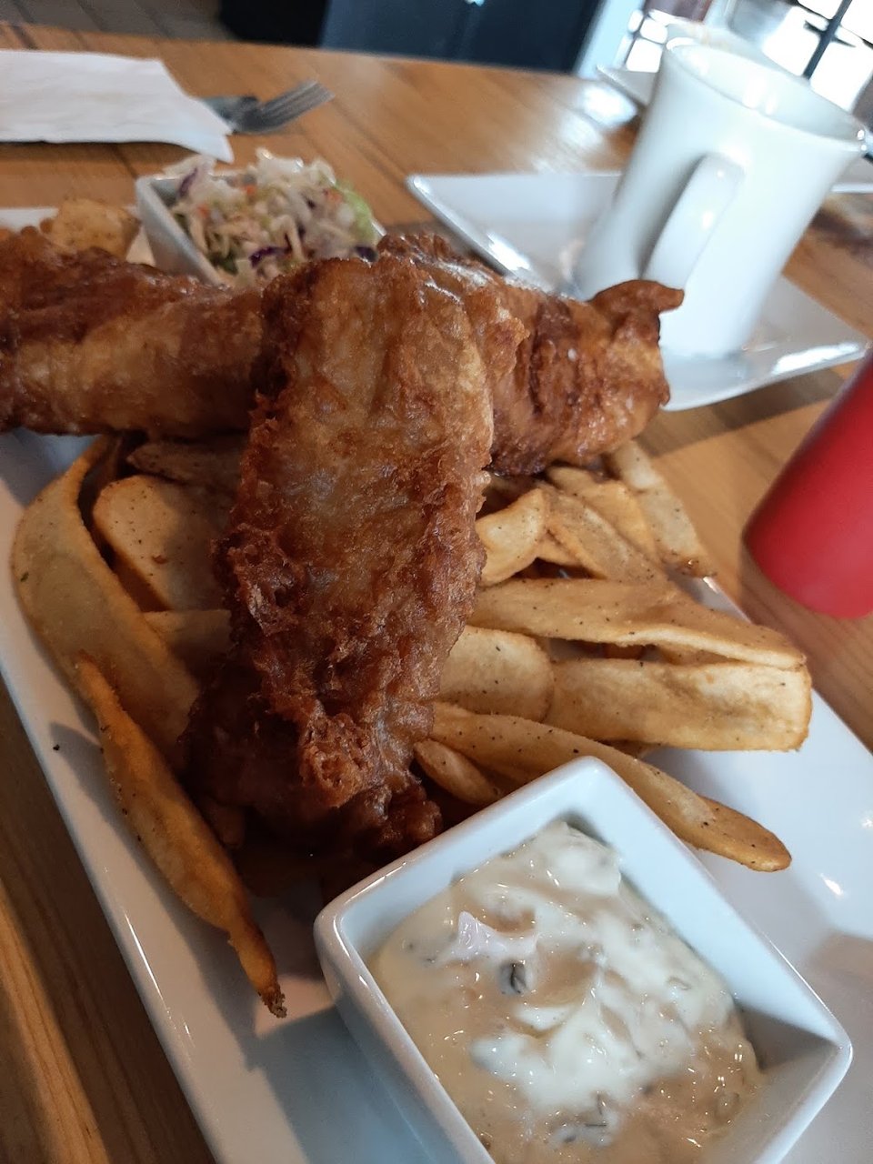 Restaurant menu listing comfort food and small plates.